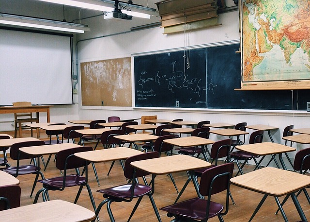 photo of classroom with empty seats