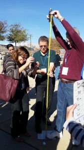 Photo of teachers conducting an experiment at a workshop